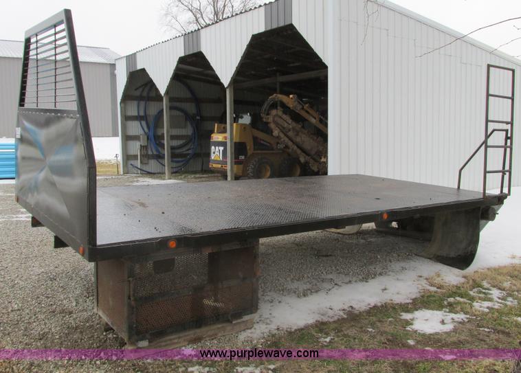 image for item F4396 Approximately 16'L x 8' flatbed