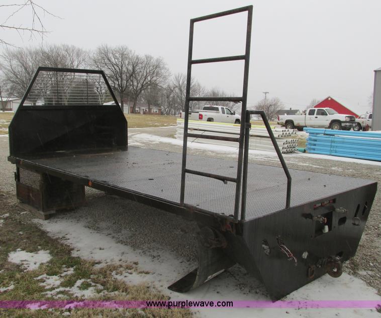 image for item F4396 Approximately 16'L x 8' flatbed