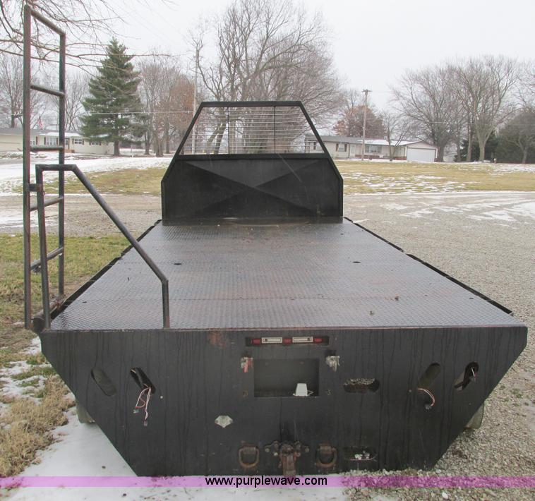 image for item F4396 Approximately 16'L x 8' flatbed