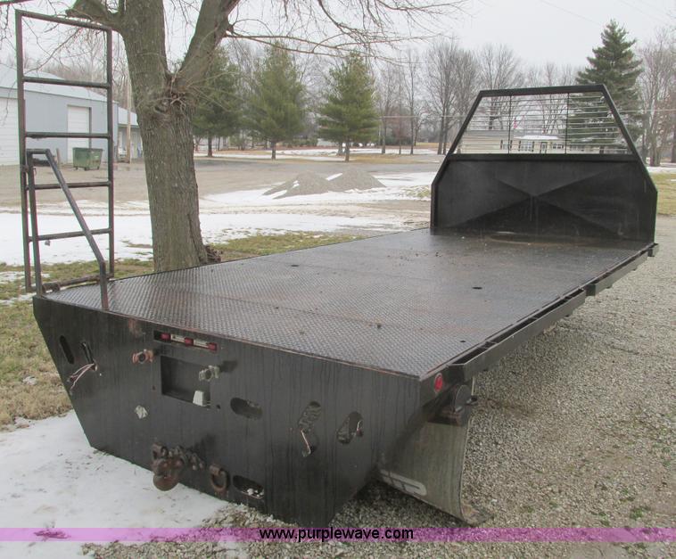 image for item F4396 Approximately 16'L x 8' flatbed