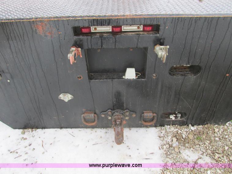 image for item F4396 Approximately 16'L x 8' flatbed