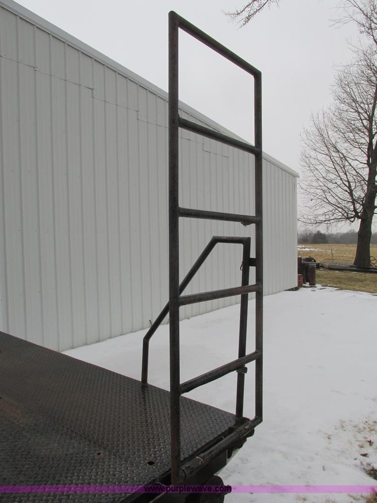 image for item F4396 Approximately 16'L x 8' flatbed