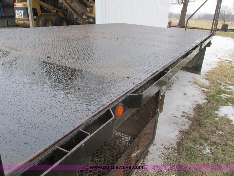 image for item F4396 Approximately 16'L x 8' flatbed