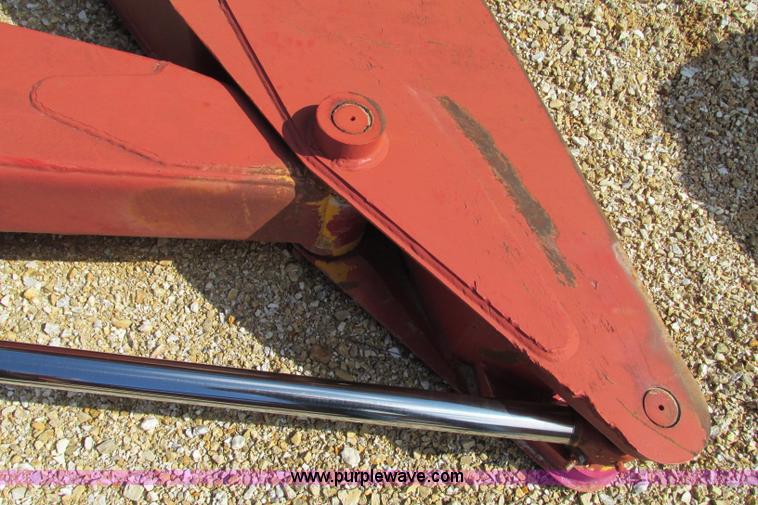 image for item F4719 Crusher feed backhoe boom