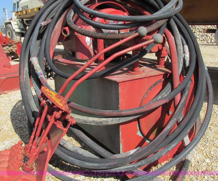 image for item F4719 Crusher feed backhoe boom