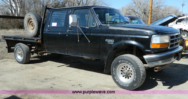 image for item G7786 1995 Ford F350 XL Crew Cab flatbed pickup truck