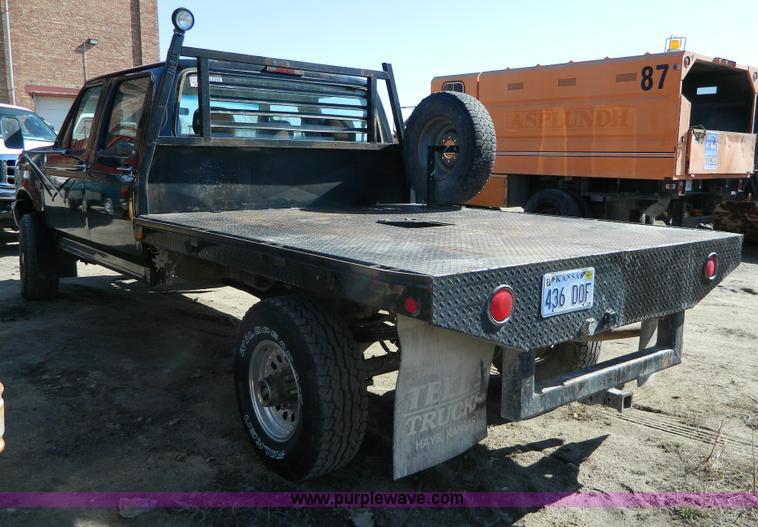 image for item G7786 1995 Ford F350 XL Crew Cab flatbed pickup truck