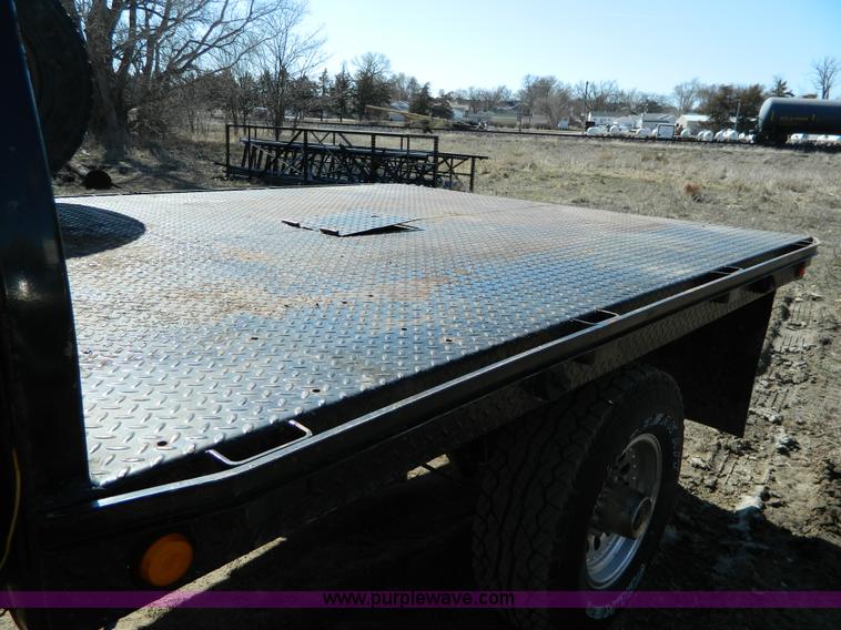 image for item G7786 1995 Ford F350 XL Crew Cab flatbed pickup truck