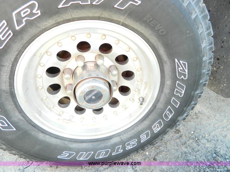 image for item G7786 1995 Ford F350 XL Crew Cab flatbed pickup truck