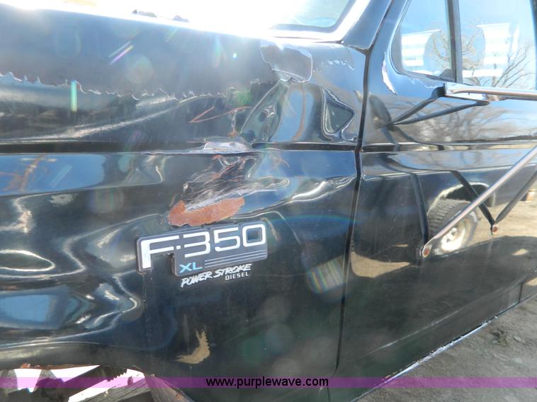 image for item G7786 1995 Ford F350 XL Crew Cab flatbed pickup truck