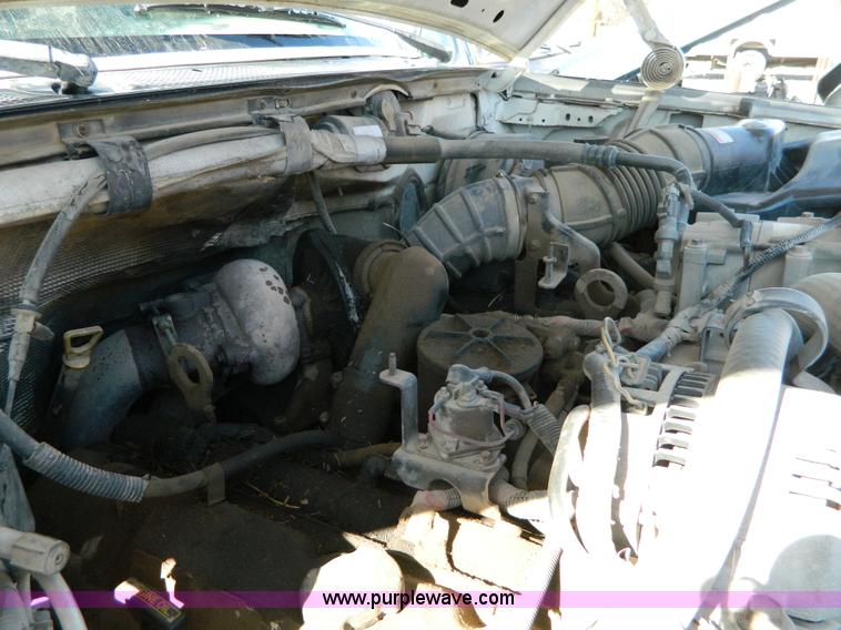 image for item G7786 1995 Ford F350 XL Crew Cab flatbed pickup truck