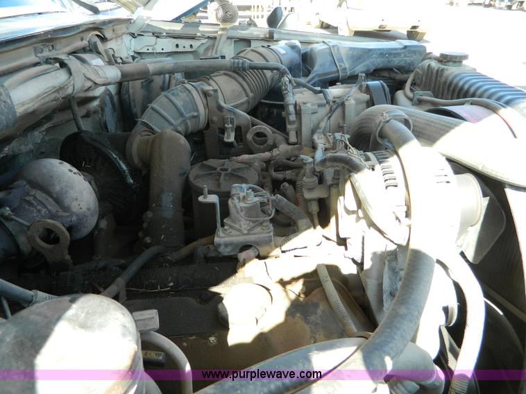 image for item G7786 1995 Ford F350 XL Crew Cab flatbed pickup truck