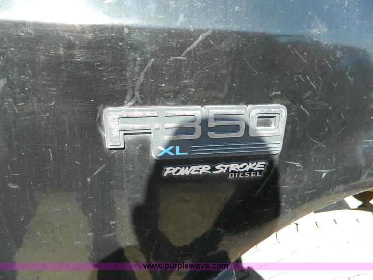 image for item G7786 1995 Ford F350 XL Crew Cab flatbed pickup truck