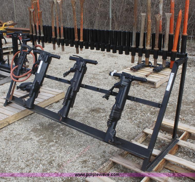 Jack hammer stands in Topeka, KS Item V9566 sold Purple Wave