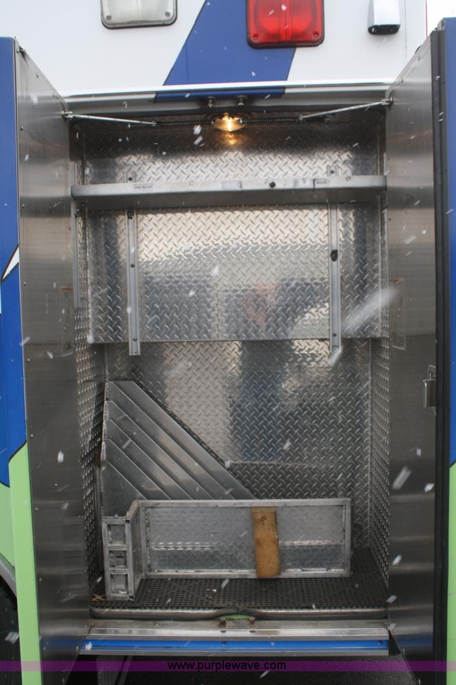 image for item F2563 1998 Freightliner FL60 ambulance