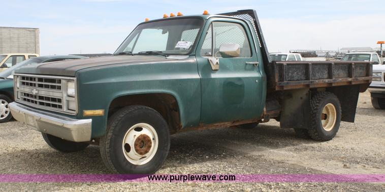 image for item F2786 1987 Chevrolet C30 flatbed pickup truck