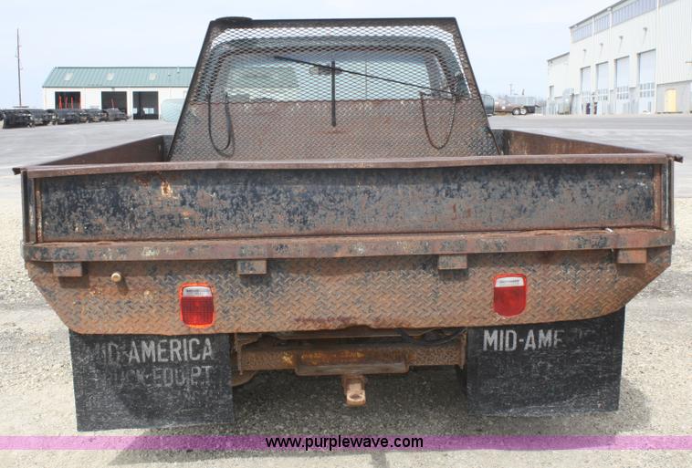 image for item F2786 1987 Chevrolet C30 flatbed pickup truck