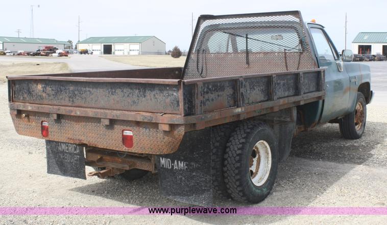 image for item F2786 1987 Chevrolet C30 flatbed pickup truck