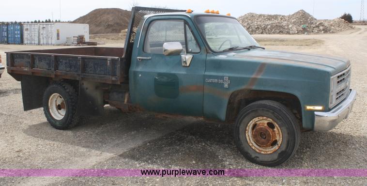 image for item F2786 1987 Chevrolet C30 flatbed pickup truck