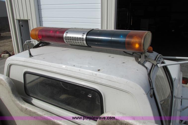 image for item F8603 1981 GMC 7000 water truck