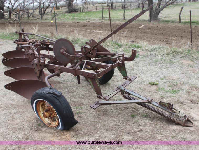 image for item AA9130 John Deere four bottom plow