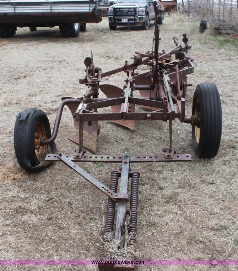 image for item AA9130 John Deere four bottom plow