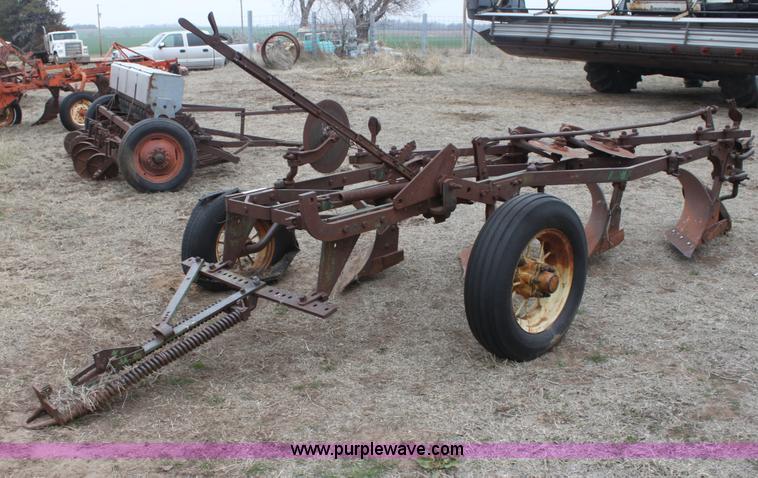 image for item AA9130 John Deere four bottom plow