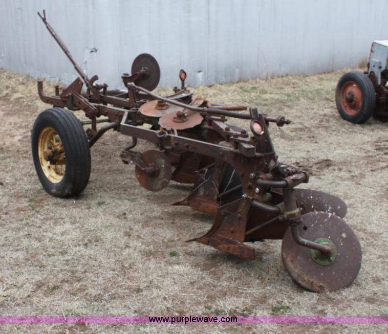 image for item AA9130 John Deere four bottom plow