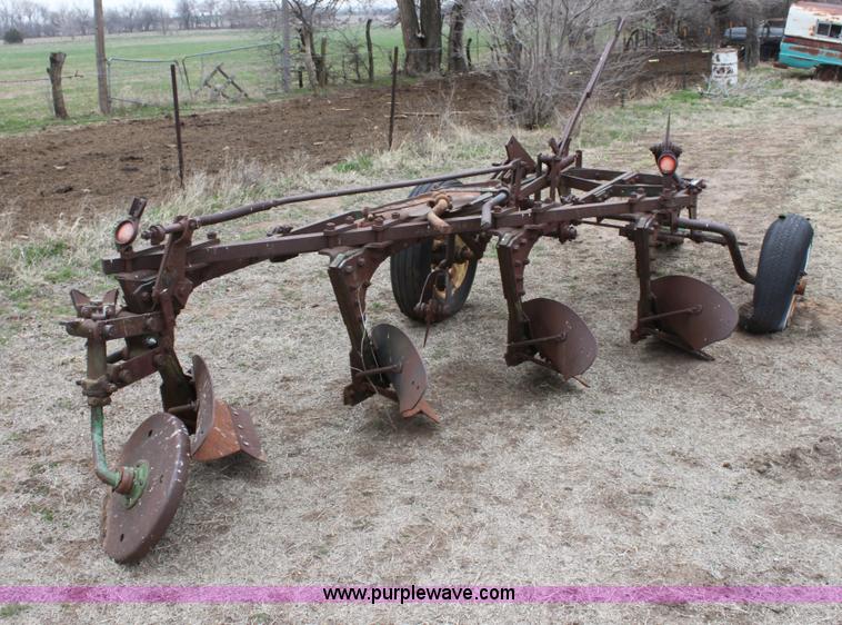 image for item AA9130 John Deere four bottom plow