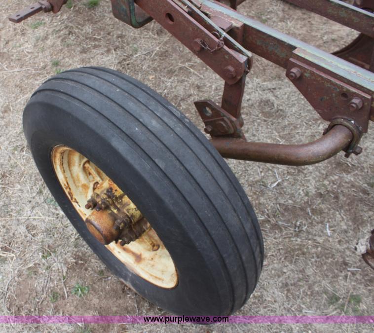 image for item AA9130 John Deere four bottom plow