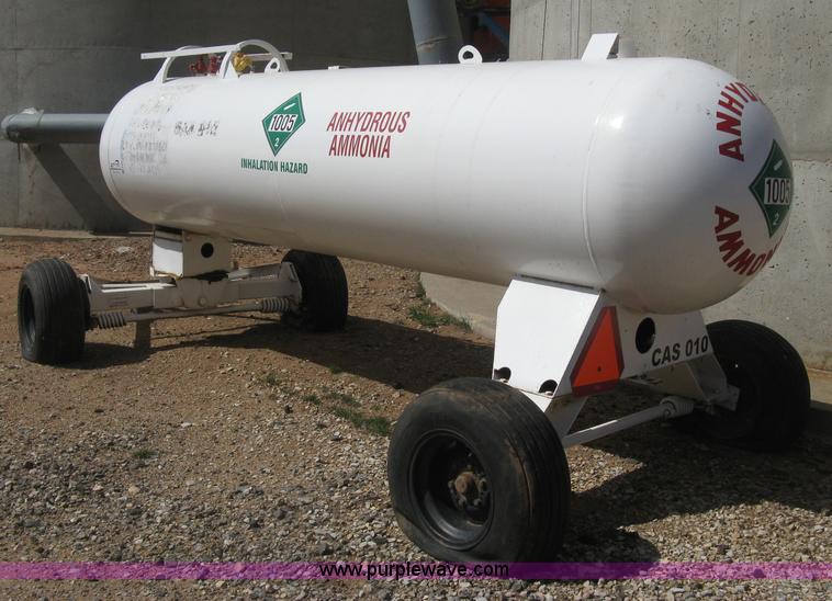 image for item E3220 Anhydrous ammonia tank on running gear