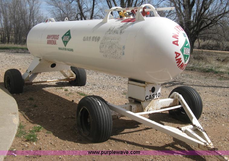 image for item E3220 Anhydrous ammonia tank on running gear