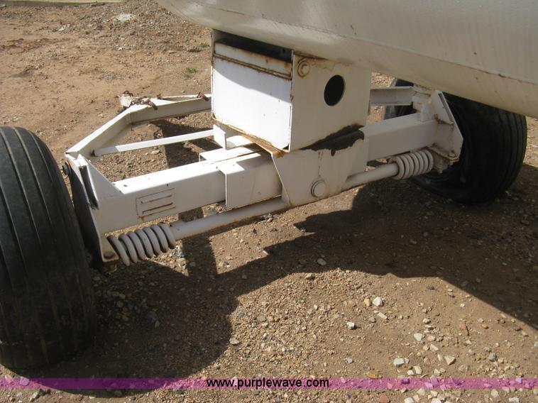 image for item E3220 Anhydrous ammonia tank on running gear