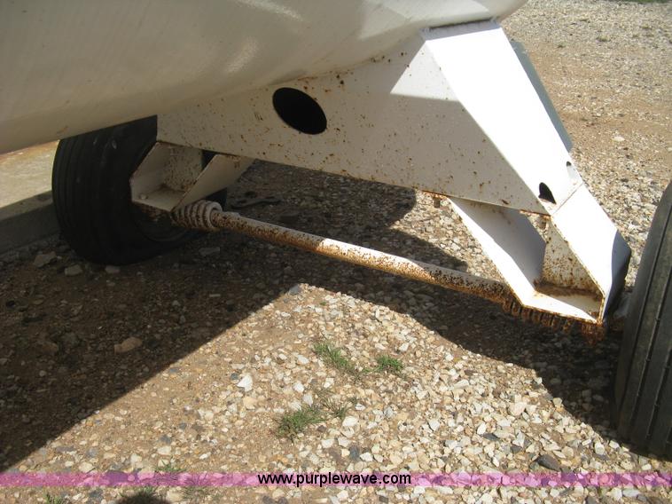 image for item E3220 Anhydrous ammonia tank on running gear