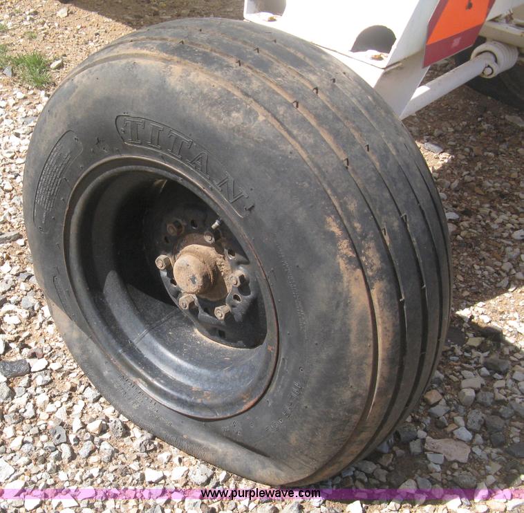 image for item E3220 Anhydrous ammonia tank on running gear