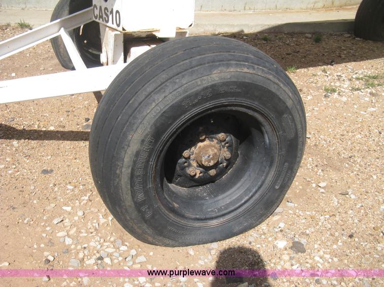 image for item E3220 Anhydrous ammonia tank on running gear