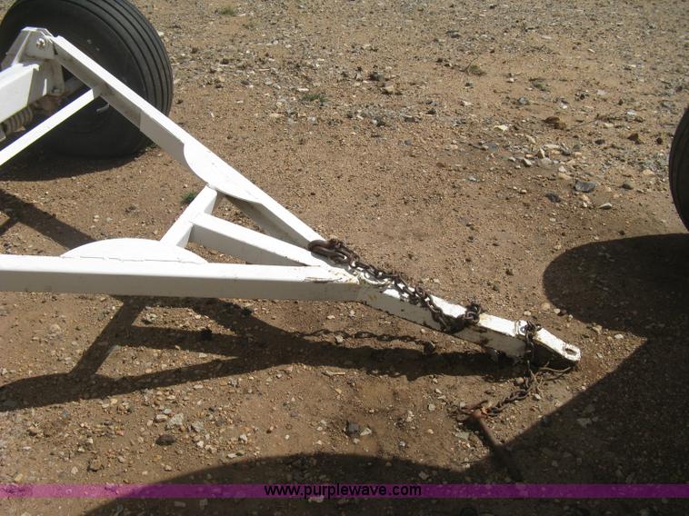 image for item E3221 Anhydrous ammonia tank on running gear