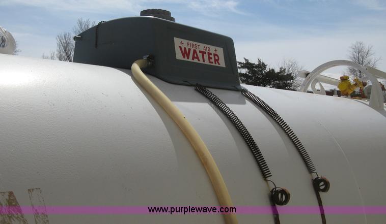 image for item E3221 Anhydrous ammonia tank on running gear