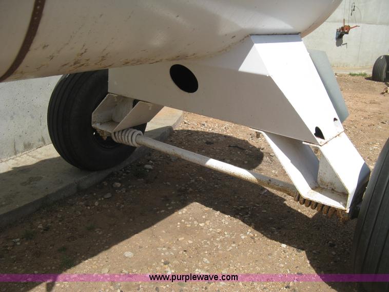 image for item E3221 Anhydrous ammonia tank on running gear