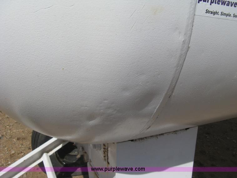 image for item E3222 Anhydrous ammonia tank on running gear