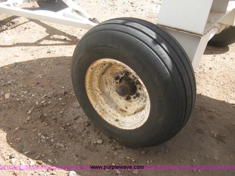 image for item E3222 Anhydrous ammonia tank on running gear