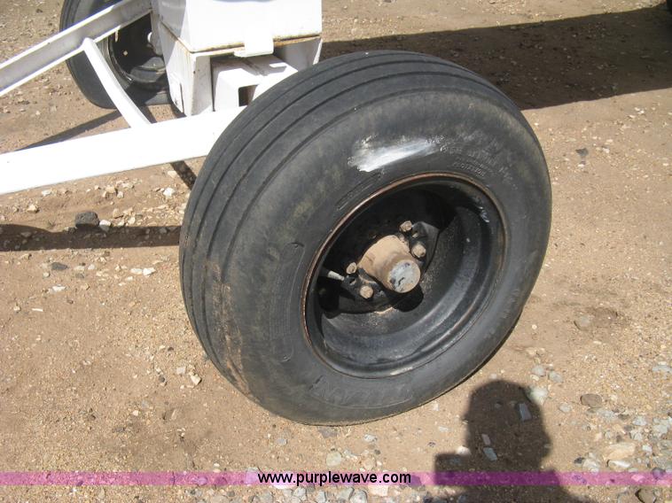 image for item E3222 Anhydrous ammonia tank on running gear