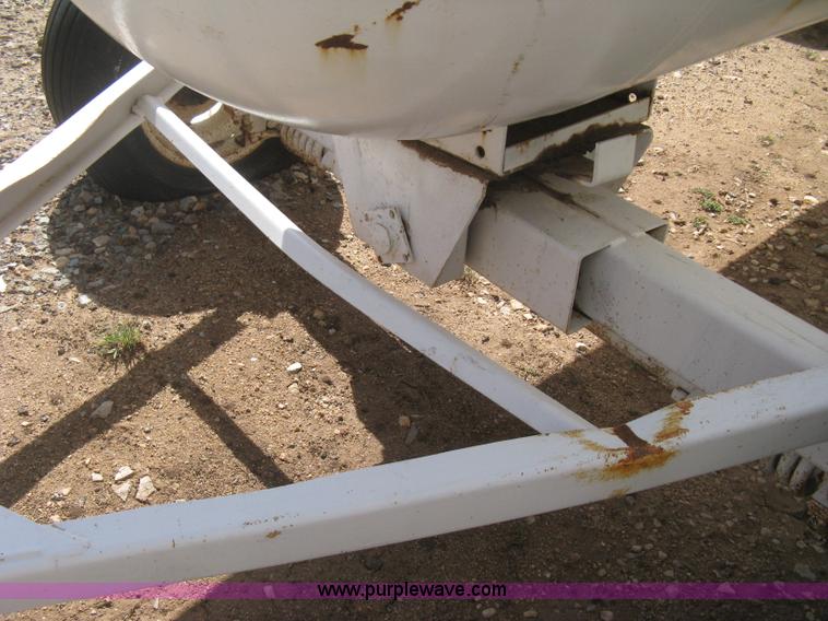 image for item E3223 Anhydrous ammonia tank on running gear
