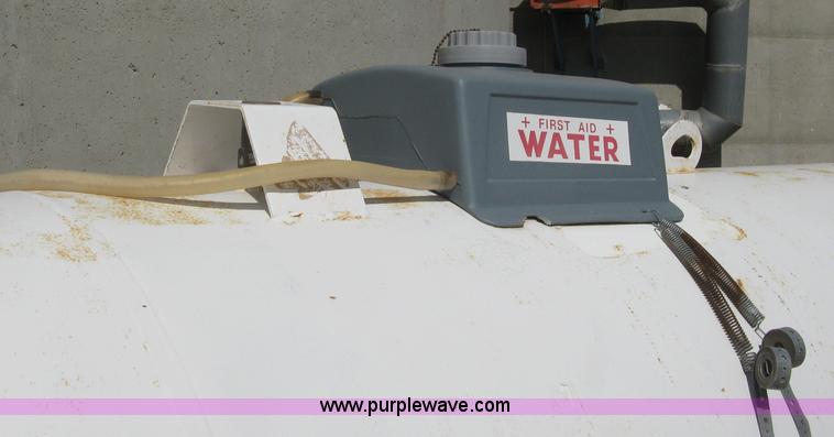 image for item E3223 Anhydrous ammonia tank on running gear