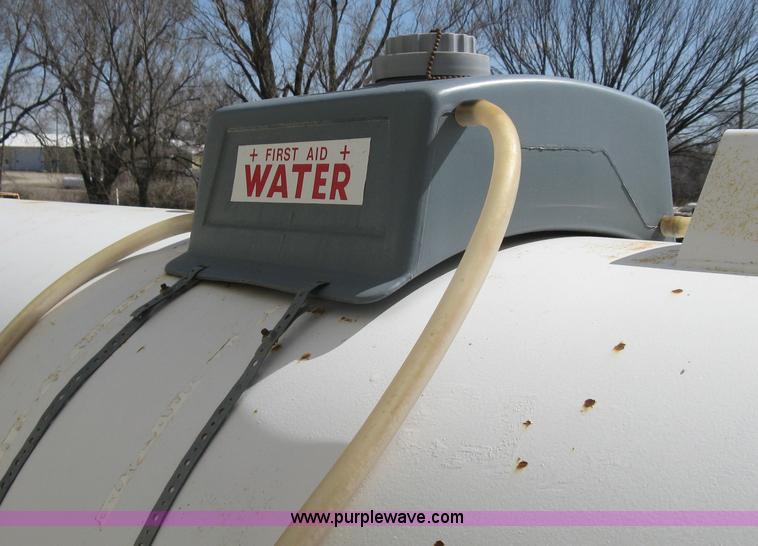 image for item E3223 Anhydrous ammonia tank on running gear