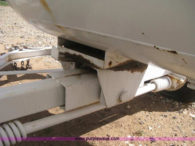 image for item E3223 Anhydrous ammonia tank on running gear
