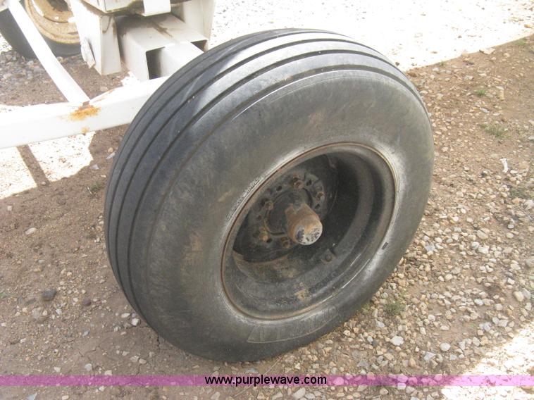 image for item E3223 Anhydrous ammonia tank on running gear