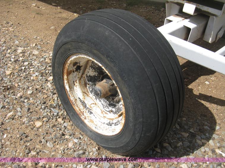 image for item E3223 Anhydrous ammonia tank on running gear