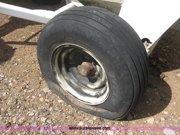 image for item E3223 Anhydrous ammonia tank on running gear