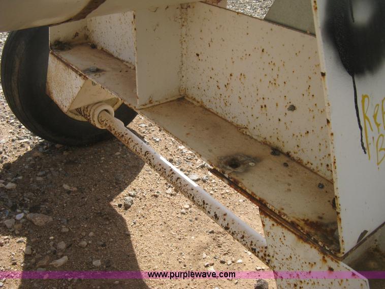 image for item E3224 Anhydrous ammonia tank on running gear